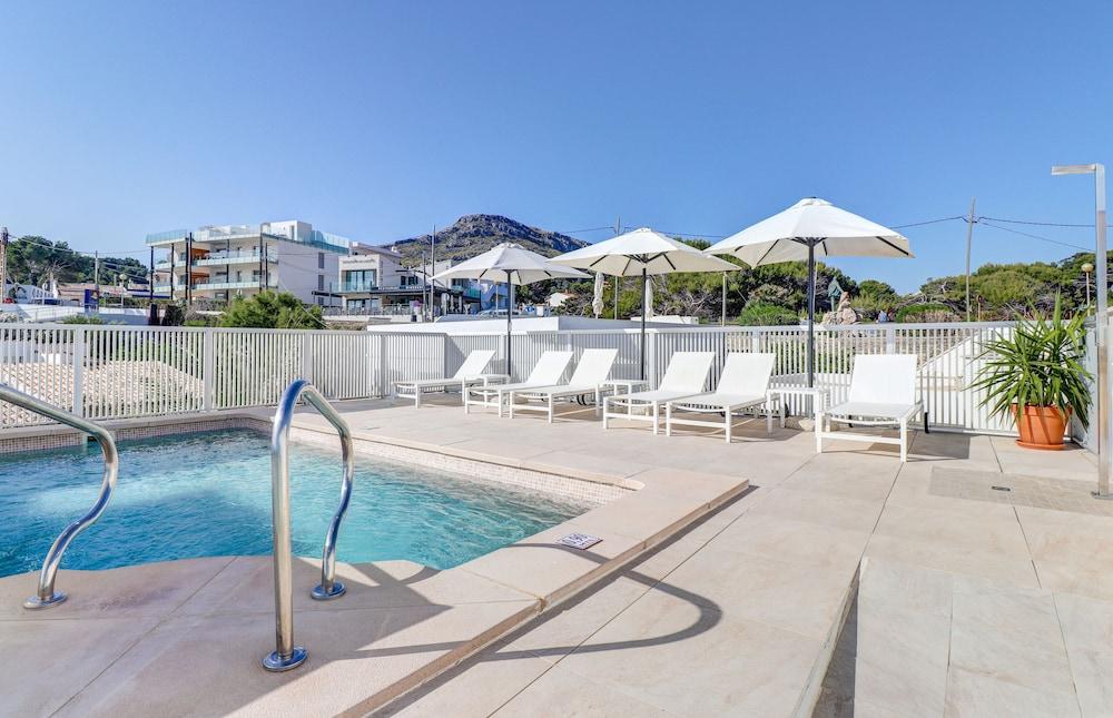 Hoposa Niu Hotel Cala de Sant Vicenc Buitenkant foto